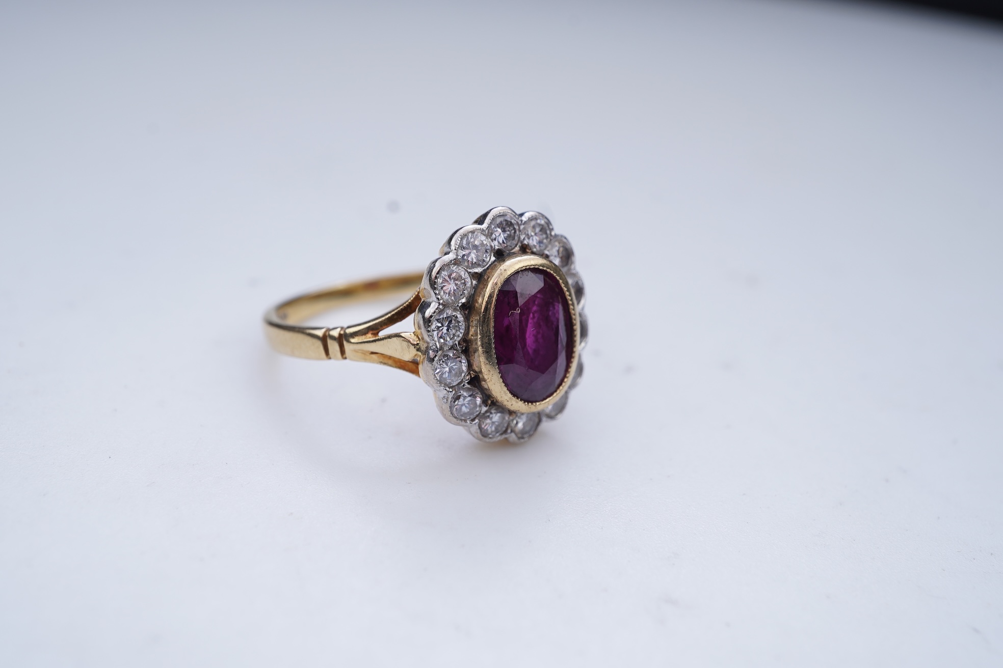 A ruby and diamond cluster ring